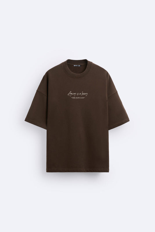 BROWN- AGING IS A LUXURY FRENCH TERRY OVERSIZED T-SHIRT